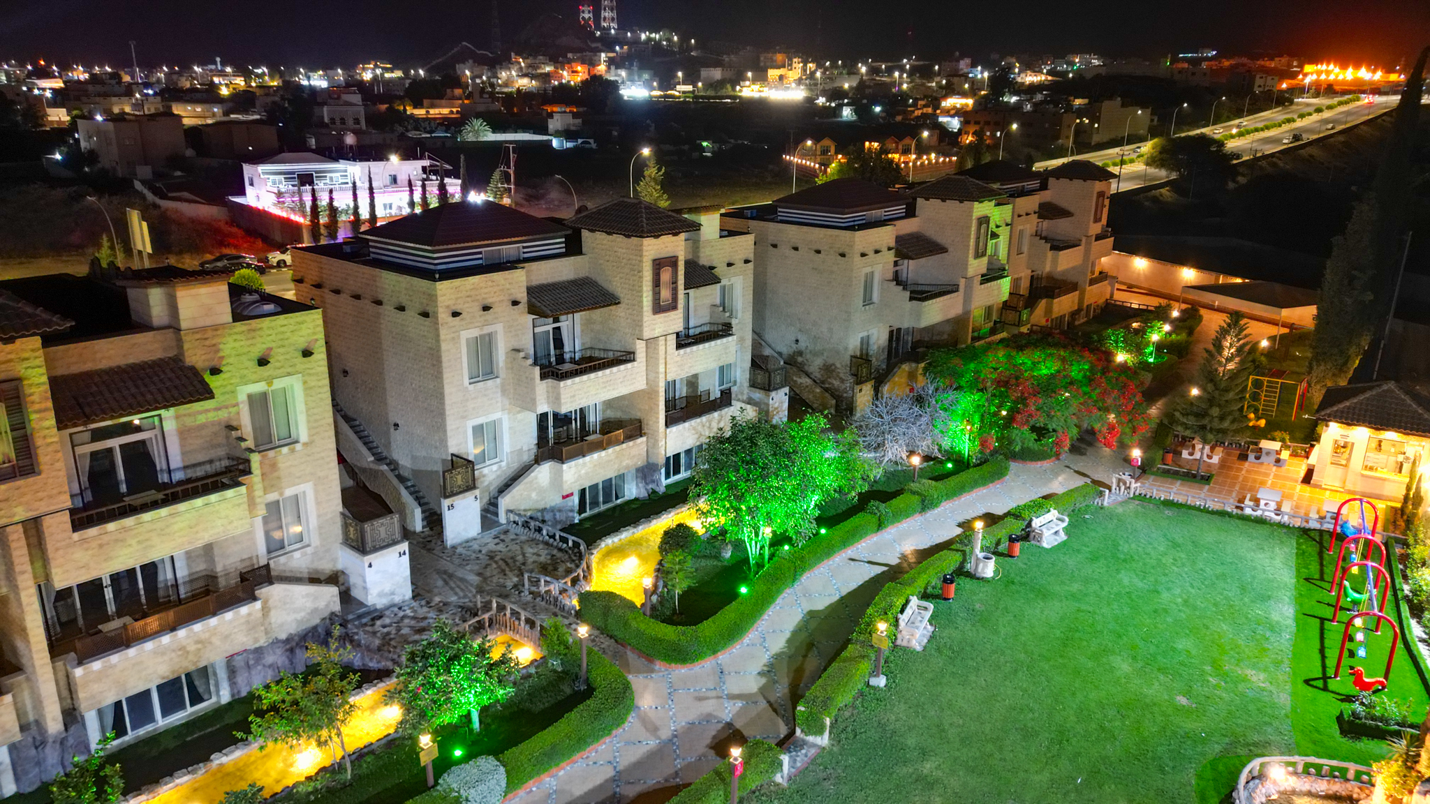 Family enjoying a private villa stay at Nahr Al Hada Resort in Al Hada